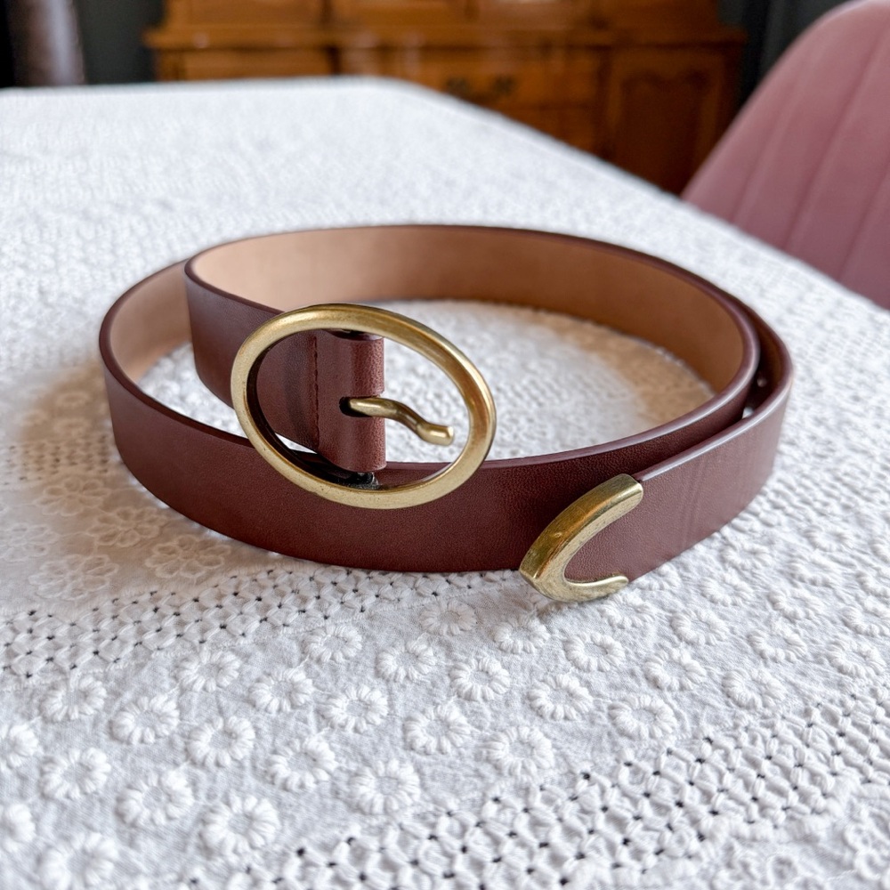 Brown western belt with gold buckle